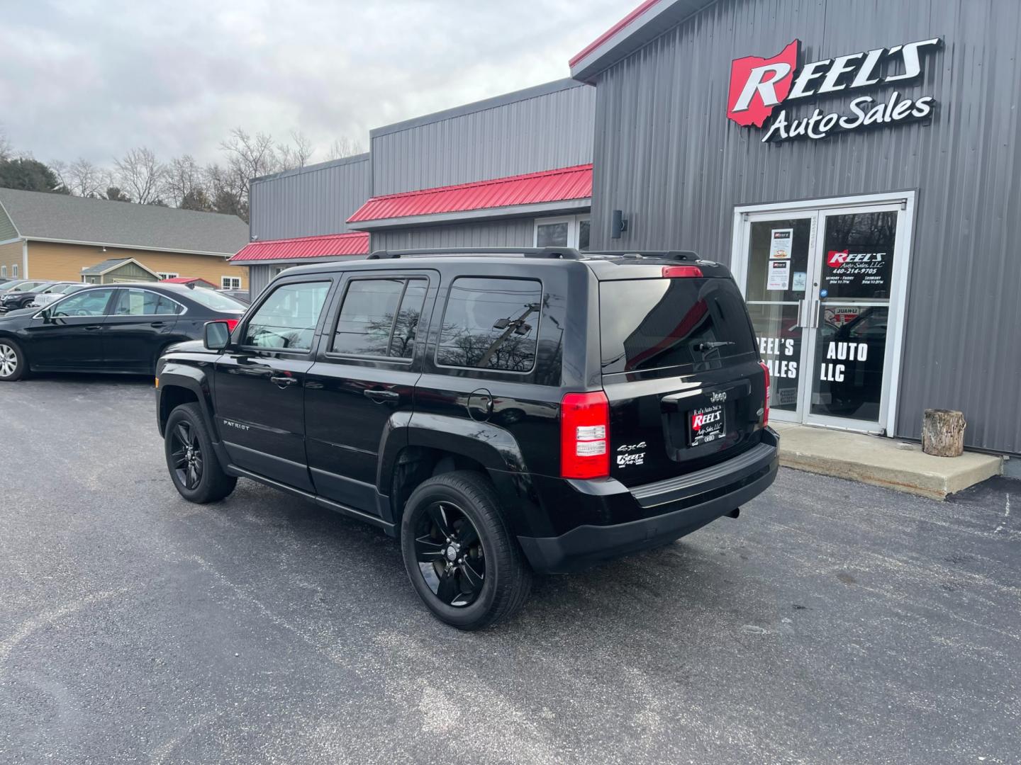 2017 Black /Black Jeep Patriot Latitude 4WD (1C4NJRFB5HD) with an 2.4L I4 DOHC 16V engine, 6-Speed Automatic transmission, located at 11115 Chardon Rd. , Chardon, OH, 44024, (440) 214-9705, 41.580246, -81.241943 - This 2017 Jeep Patriot Latitude with 4WD and only 55,000 miles on the odometer. This SUV comes equipped with a 2.4L engine for powerful performance. It features a comfortable and spacious interior with modern amenities. The 4WD capability ensures that you can handle any terrain or weather conditions - Photo#12